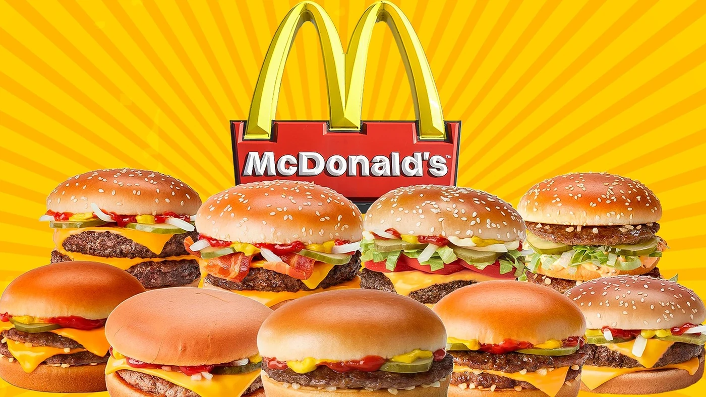 Burger selection displayed on a bright yellow background